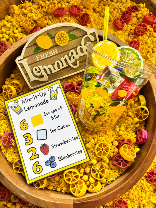 Close-up of a Mix-It-Up Lemonade recipe card with lemonade sensory materials for preschool math and sensory play.