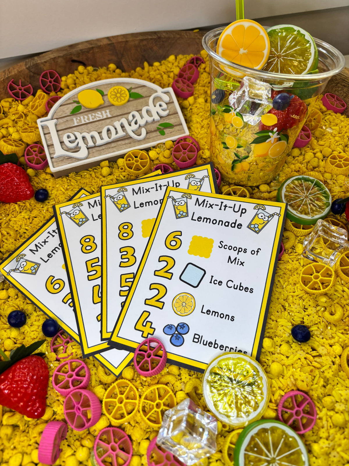 Set of Mix-It-Up Lemonade recipe cards with a lemonade sensory tray for hands-on preschool learning.